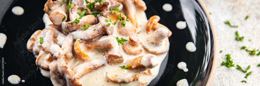 chanterelle julienne mushroom cream sauce appetizer meal food snack on the table copy space food background rustic top view 