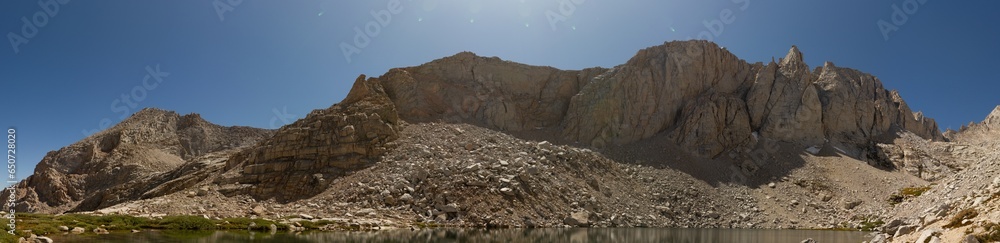 Panorama shot of huge white granite rocks over Scout Boys lake under top White Mountain, usa Panorama shot of huge white granite rocks over Scout Boys lake under top White Mountain, usa
