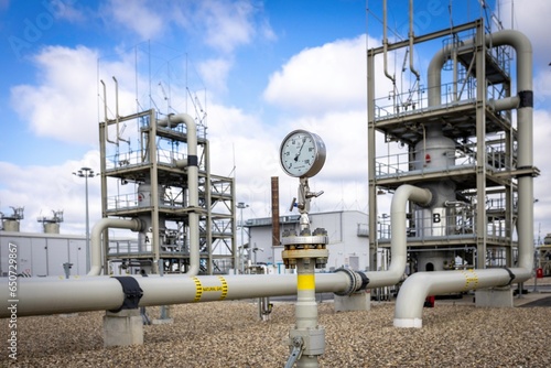 Manometer on natural gas pipeline compressor station with other gas facilities