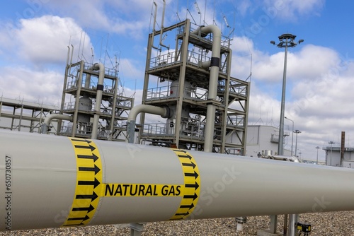 Natural gas main high pressure pipeline with yellow label