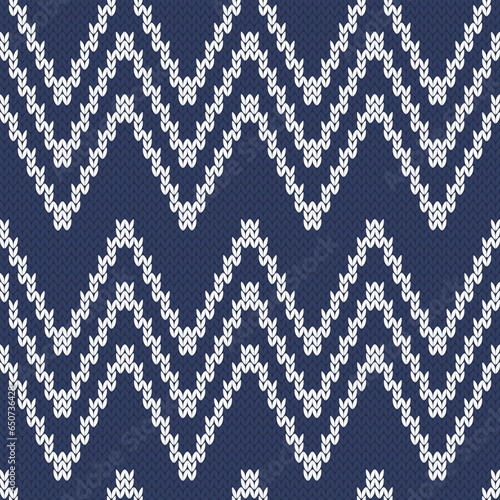 Zig zag knitted seamless pattern for sweater or socks design. White on navy background. Vector illustration