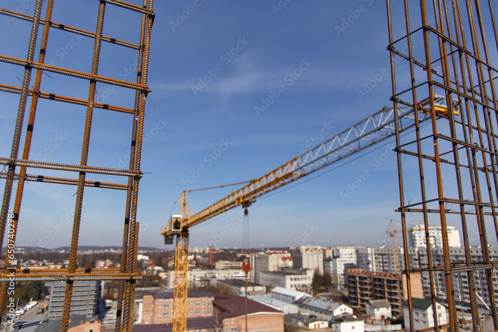 A construction crane during work at a construction site