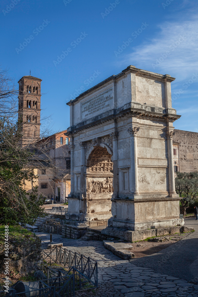Triumphal arch of Roman emperor Titus on Forum Romanum in Rome, Italy
