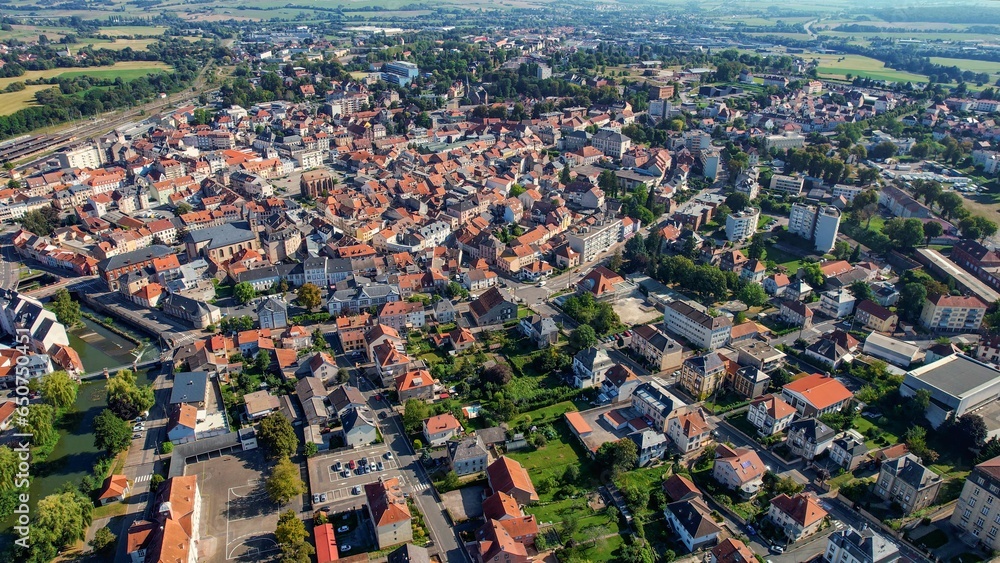 Aerial of the old town around the city Sarrebourg in France