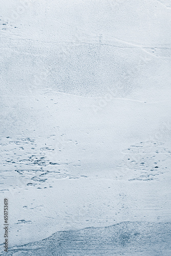 Fotografía Light blue textured concrete background with light base darker in the recesses