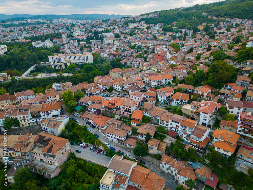 An aerial view of Veliko Tarnovo reveals a Bulgarian city rich in history and culture, with its beautiful buildings, streets, and picturesque hills.