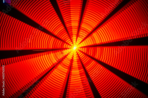 Photography Abstract background asset of yellow sun center with rippling red and orange ligh