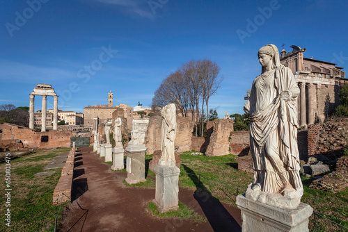 Statues of virgin vestals and ruins of temples on the Roman Forum in Rome, Italy