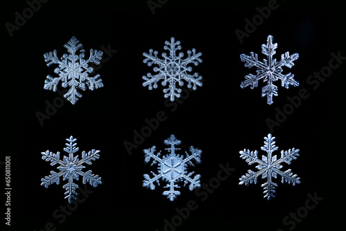 Collection set of six snowflakes chrystals close up macro on black background