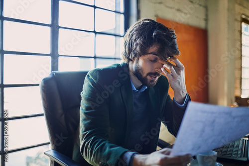 Εκτύπωση καμβά Young Caucasian male designer stressed with how his work turned out in a startup