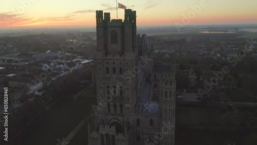 Scenic aerial panning panorama of beautiful Ely Cathedral and countryside of Ely Cambridgeshire England, United Kingdom. Famous travel destination UK photo