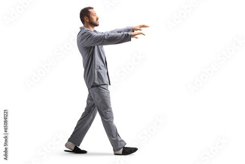 Full length profile shot of a man sleepwalking