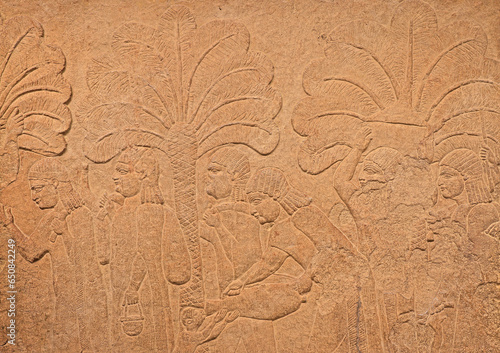 Obraz na plátně Stone bass-relief of procession of captive Babylonian women, Northen Iraq, Assyr