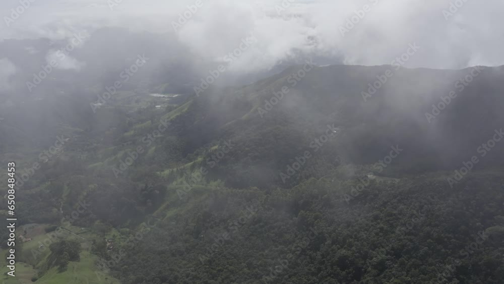 Flying through clouds above Tres Picos national park natural landscape in Rio de Janeiro, Brazil Flying through clouds above Tres Picos national park natural landscape in Rio de Janeiro, Brazil