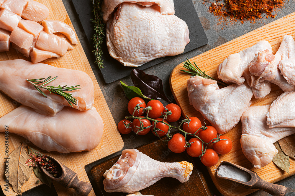 various parts of chicken cut up and ready for cooking