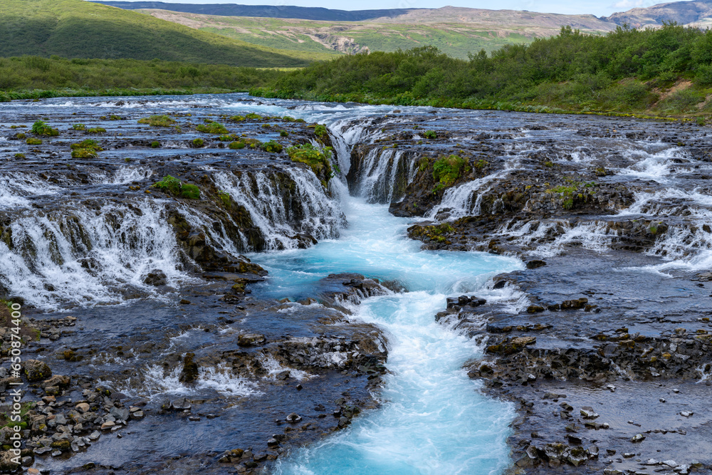 Bruarfoss Waterfall, the teal water along the Golden Circle of Iceland Bruarfoss Waterfall, the teal water along the Golden Circle of Iceland