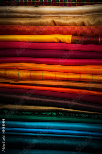 stack of colorful silk fabrics