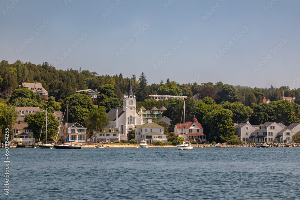 A Steepled Church Along the Shoreline of Mackinac Island, Lake Michigan As seen from the Ferry
