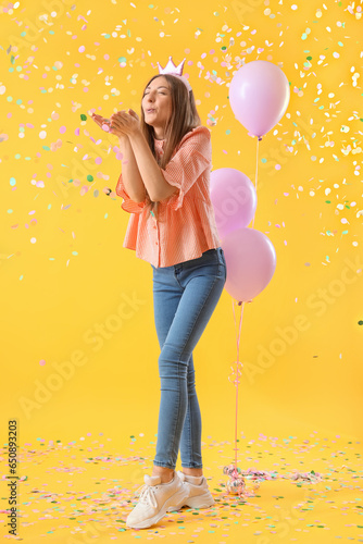 Happy young woman celebrati...