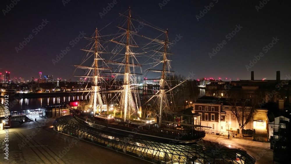Αυτοκόλλητο large ship on the side of a body of water with lots of lights on
