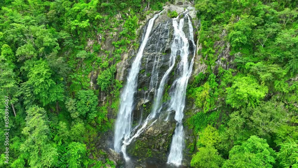 The surrounding area of Khlong Lan Waterfall is densely forested, showcasing rich biodiversity. The national park is home to various species of flora and fauna, including lush tropical plants. Drone.
The surrounding area of Khlong Lan Waterfall is densely forested, showcasing rich biodiversity. The national park is home to various species of flora and fauna, including lush tropical plants. Drone.