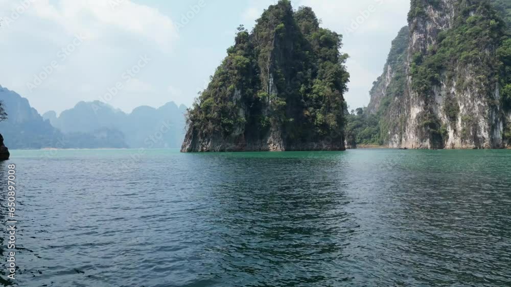 Boat trip to the islands in Thailand. Khao Sok National Park and Cheo Lan Lake. Aerial view from a helicopter Boat trip to the islands in Thailand. Khao Sok National Park and Cheo Lan Lake. Aerial view from a helicopter