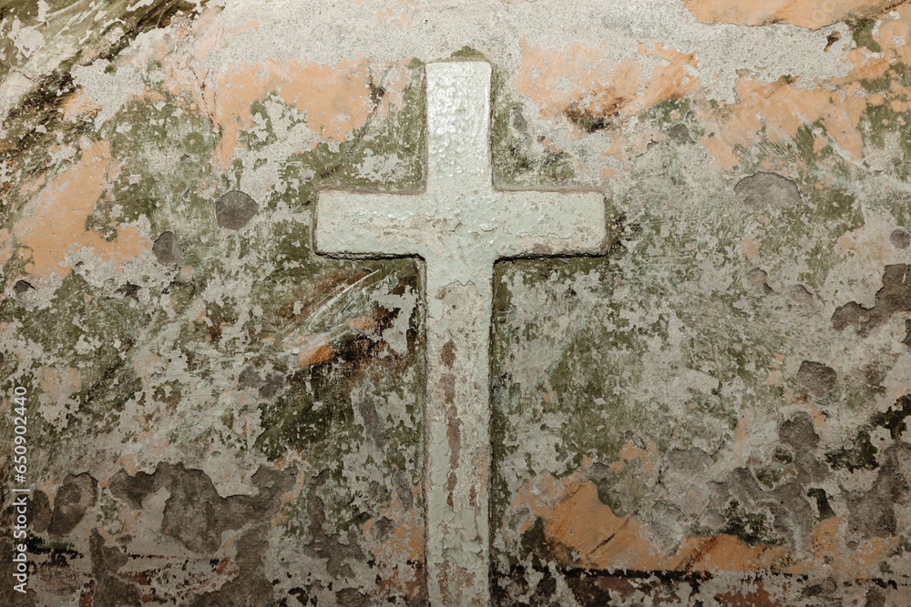 A clay model of a large Cross in the basement of the Holy ancient temple