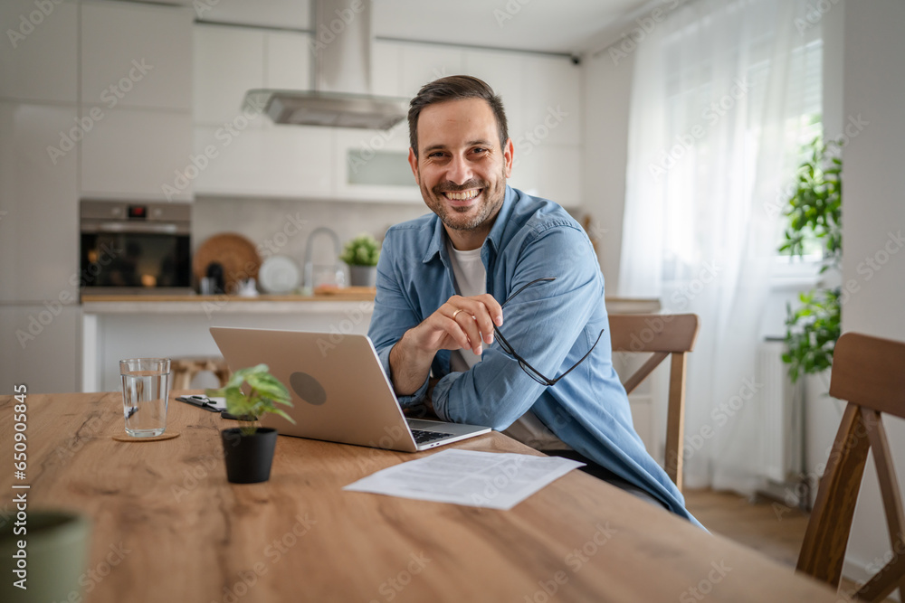 one man adult caucasian work on laptop at home happy smile one man adult caucasian work on laptop at home happy smile