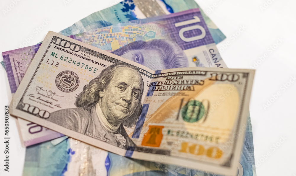 Canadian dollars vs. US dollars, which are important for board trading between these neighboring countries. Canadian dollars vs. US dollars, which are important for board trading between these neighboring countries.