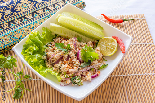 Larb is a type of Lao meat salad that is the national dish of Laos. Larb is also eaten in other Southeast Asian countries where the Lao have migrated and extended their influence.