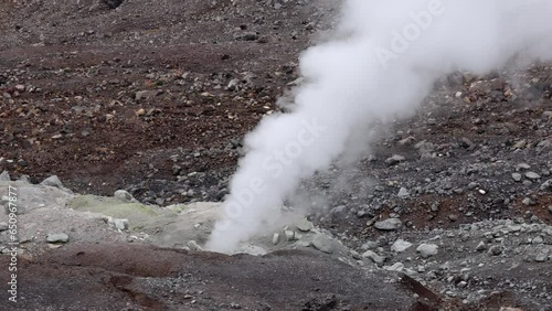 Hot gas and water vapor from fumarole in rocky terrain on Mt Asahi