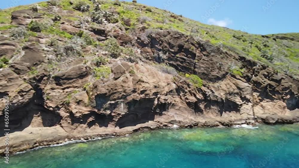 Beautiful pan view of Coin de Mire island on a sunny day. Beautiful pan view of Coin de Mire island on a sunny day.