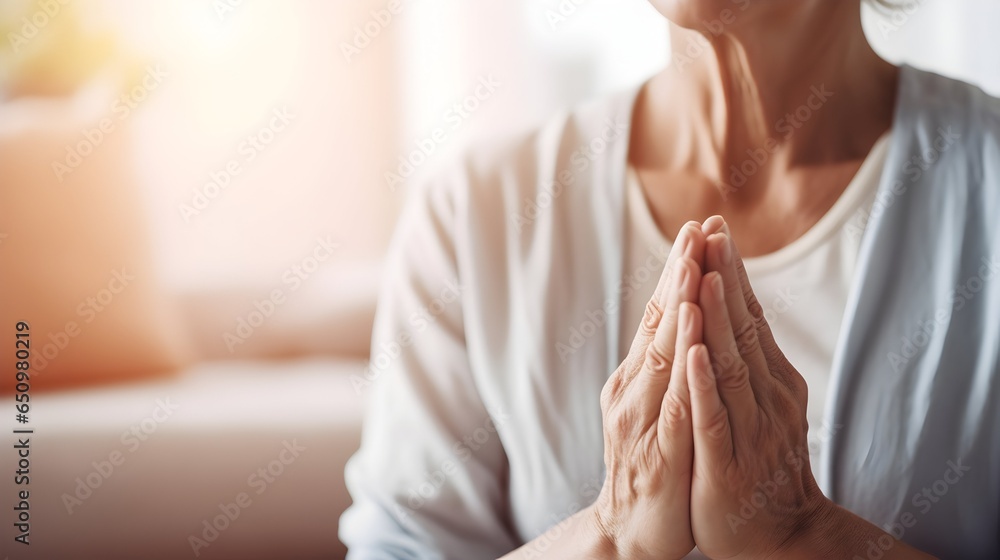 close up of a middle-aged woman's hands together, praying devout . Meditating. Engaged in a process of self-healing - obrazy, fototapety, plakaty 