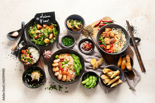 Asian food background with various ingredients on white background , top view.
