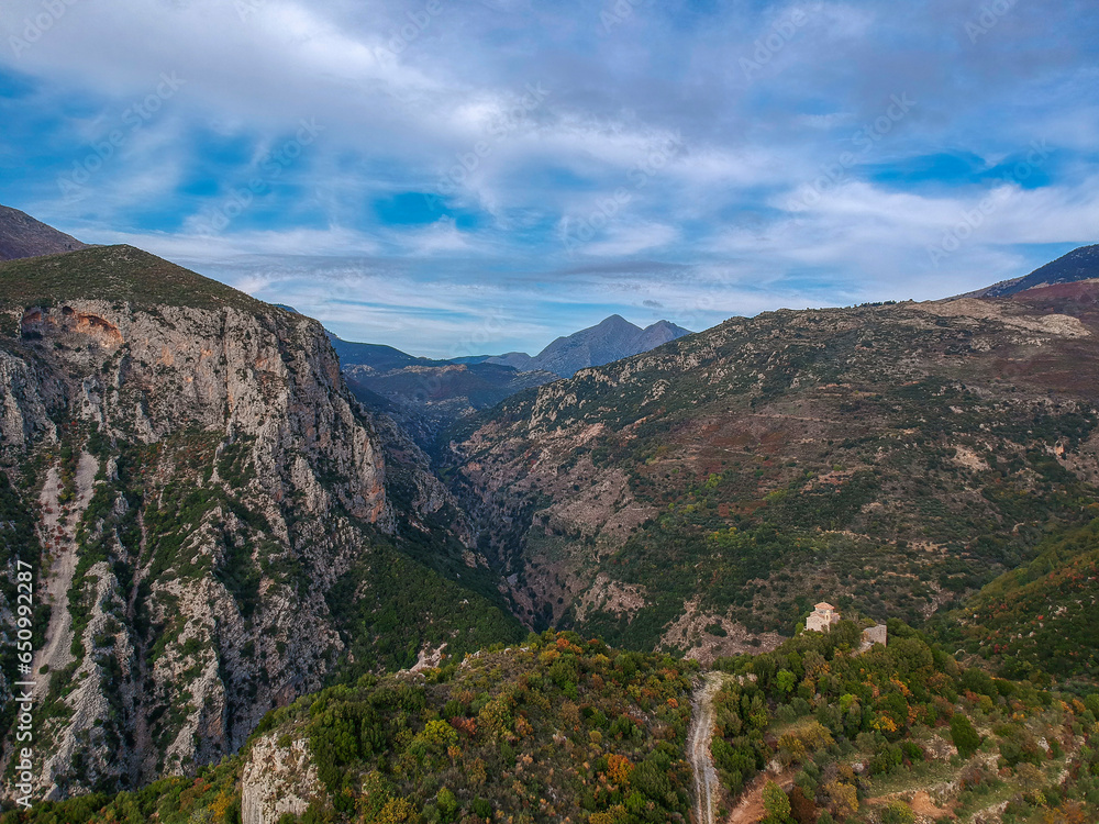 Amazing view over ridomo gorge in mountainous Mani area. At bottom rignt Prophet Helias traditional christian chapel in Mani, Messenia, Peloponnese, Greece