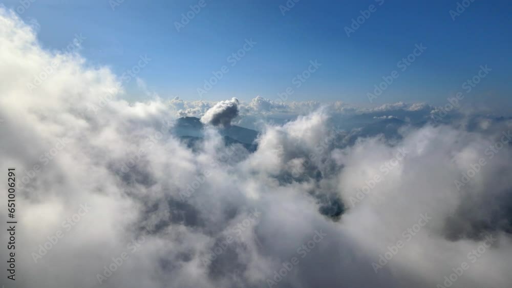 Flying through the clouds and over mountains Flying through the clouds and over mountains