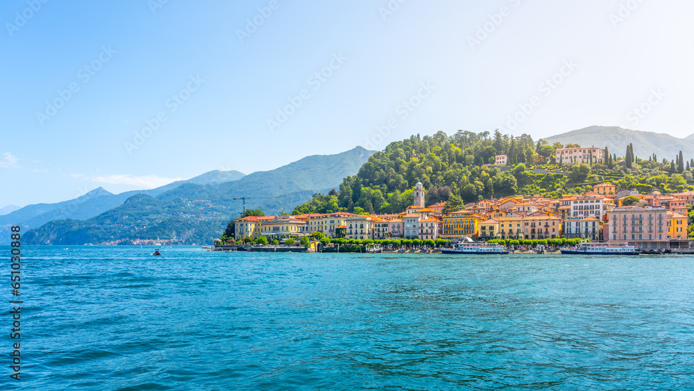 Bellagio town at Como Lake on sunny summer day. Idyllic view from ferry. Lombardy, Italy