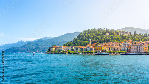 Fototapeta Naklejka Na Ścianę i Meble -  Bellagio town at Como Lake on sunny summer day. Idyllic view from ferry. Lombardy, Italy