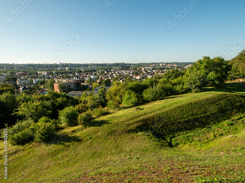 View on Kaunas city from a viewing point. Lithuania, warm sunny day with clean blue sky. Town sky line. Nobody. Big town known with huge historic heritage, economy trade and night life.