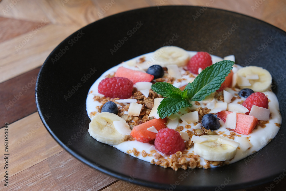 close up plate of fruit yogurt on table. Healthy food close up plate of fruit yogurt on table. Healthy food