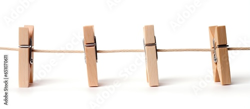Wooden pegs on a rope holding nothing