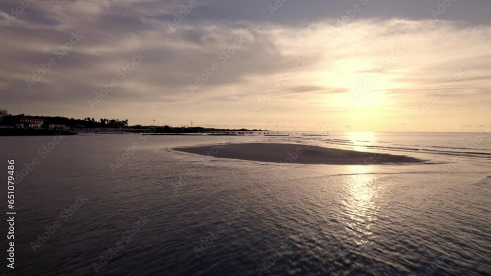 Drone video of a golden sunset on the sandy coast of Jeju Island, South Korea Drone video of a golden sunset on the sandy coast of Jeju Island, South Korea