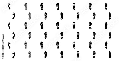 Black human footprints icon. Human footprints tracking path. Set of human footprint, tracking path icons