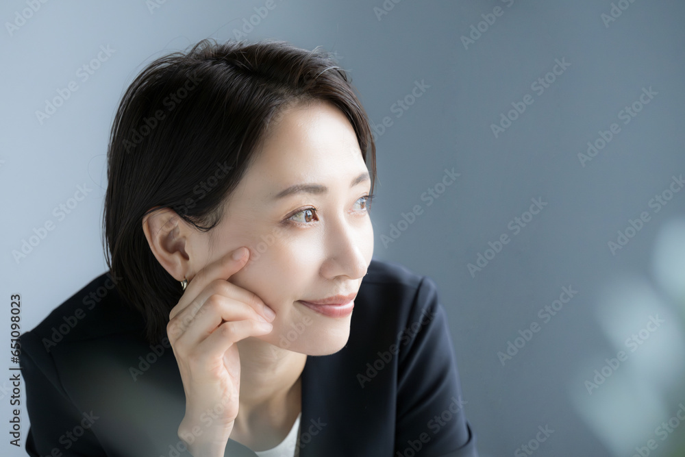 Cool handsome cheeky businesswoman, smile, close up. Cool handsome cheeky businesswoman, smile, close up.
