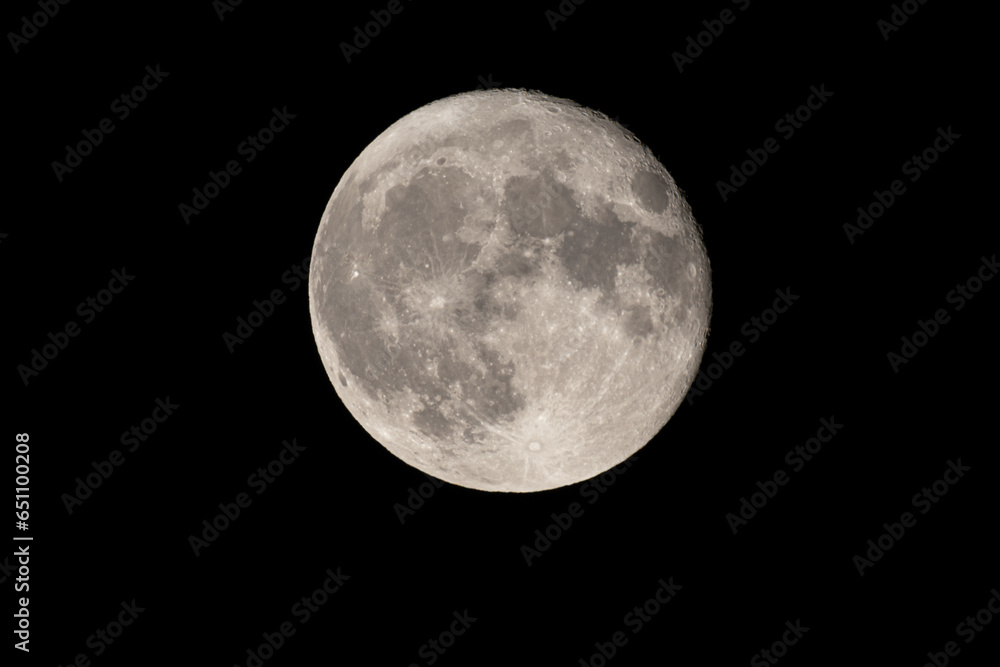 Full moon photographed with a telescope and reflex camera where the craters on the lunar surface can be seen. The seventh continent will be the destination for space travel and future moon landings Full moon photographed with a telescope and reflex camera where the craters on the lunar surface can be seen. The seventh continent will be the destination for space travel and future moon landings