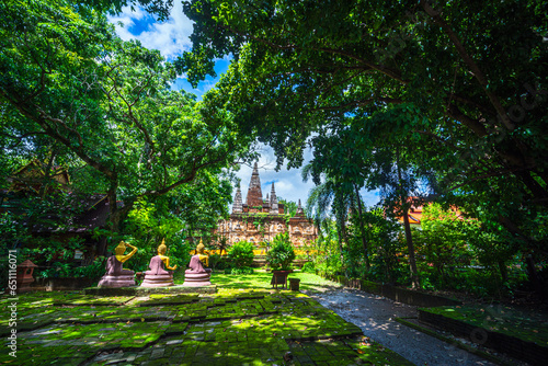 Wat Chet Yot or Wat Photharam Maha Wihan, seven pagoda temple It is a major tourist attraction in Chiang Mai, Thailand.with evening,Temple in Chiang Mai. photo