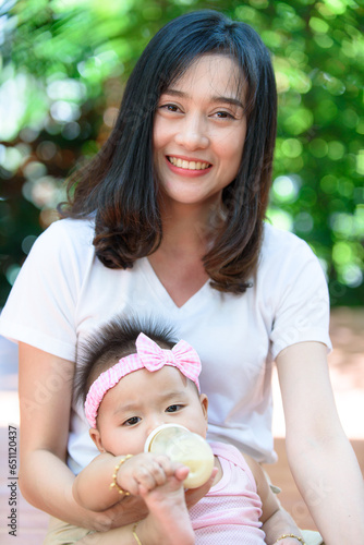 Baby drink milk from bottle