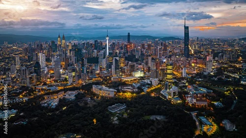Kuala Lumpur city skyline with dramatic sky , twilight scene . Malaysia .
 photo