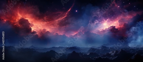 Illustration of a fantasy space nebula glowing with cosmic energy and infinite colors in the dark night sky © AkuAku