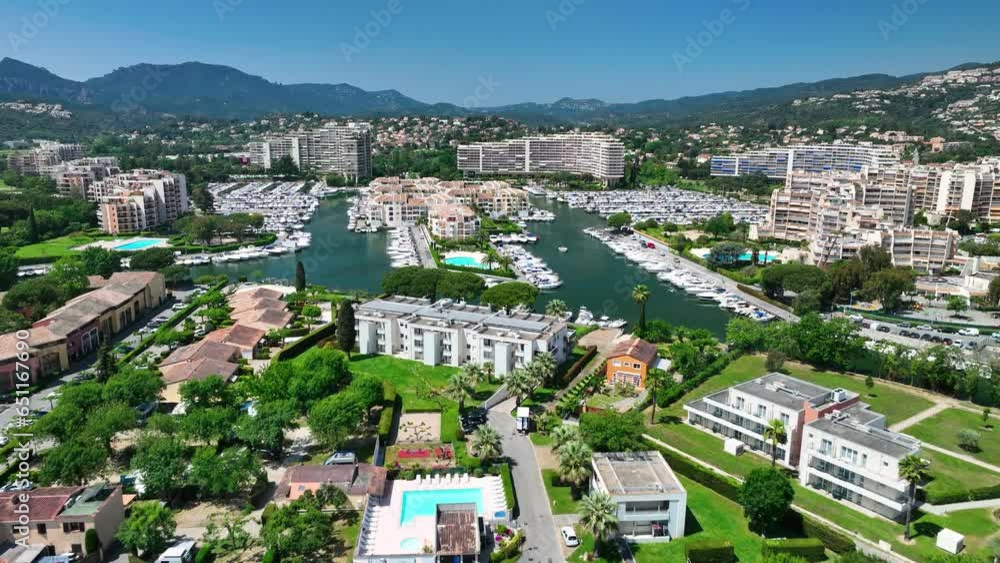 A high-angle view showcases the elegance of Mandelieu-la-Napoule's marina haven of luxury.
A high-angle view showcases the elegance of Mandelieu-la-Napoule's marina haven of luxury.